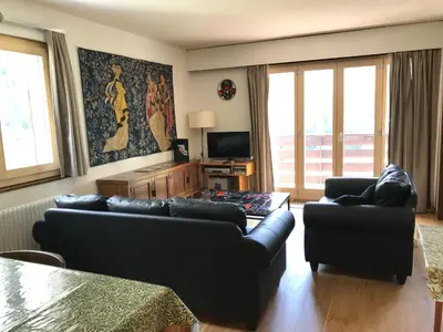 Ein Sitzbereich in der Unterkunft Les Arolles