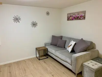 Ein Sitzbereich in der Unterkunft Mönch Amazing Apartment Grindelwald