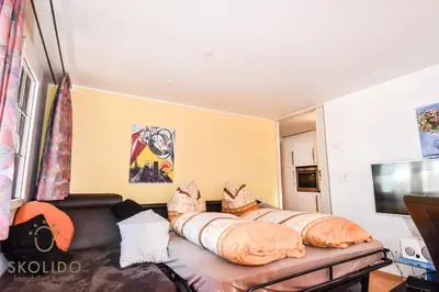 Ein Bett oder Betten in einem Zimmer der Unterkunft Wohnung in Zermatt mit postkarten Matterhornblick