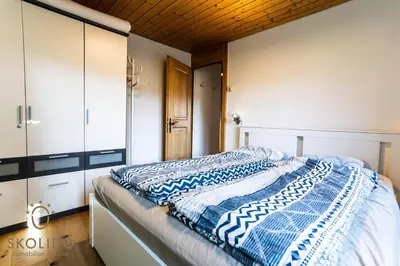 Ein Bett oder Betten in einem Zimmer der Unterkunft 2-Zimmerwohnung an zentraler Lage/Ski-in, Ski-out