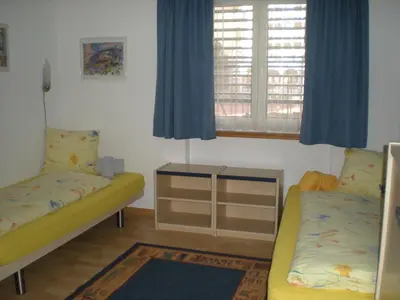Ein Bett oder Betten in einem Zimmer der Unterkunft Appartementhaus La Promenade