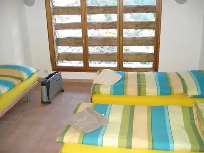 Ein Bett oder Betten in einem Zimmer der Unterkunft Rustico Pacifico