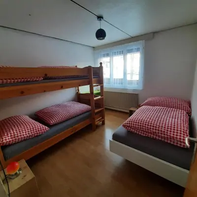 Ein Bett oder Betten in einem Zimmer der Unterkunft Bunderbach