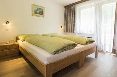 Ein Bett oder Betten in einem Zimmer der Unterkunft Haus Adora