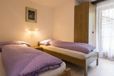 Ein Bett oder Betten in einem Zimmer der Unterkunft Haus Adora