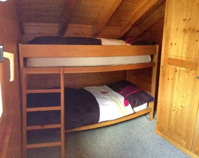Ein Bett oder Betten in einem Zimmer der Unterkunft L'Eau-Vive