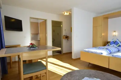 Ein Bett oder Betten in einem Zimmer der Unterkunft Haus Orion