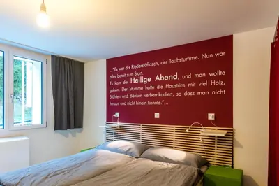 Ein Bett oder Betten in einem Zimmer der Unterkunft Legendär Zermatt
