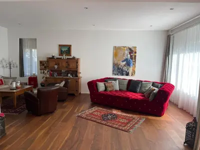 Ein Sitzbereich in der Unterkunft Alpine City Suite