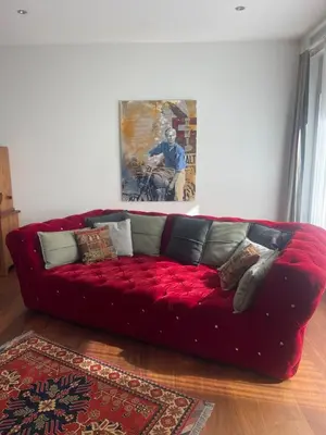 Ein Sitzbereich in der Unterkunft Alpine City Suite