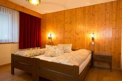 Ein Bett oder Betten in einem Zimmer der Unterkunft Haus Alba
