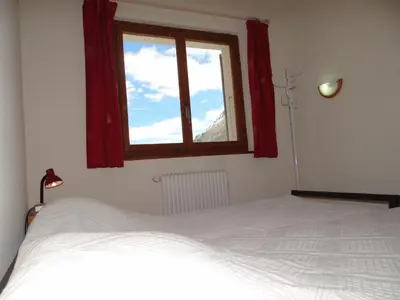 Ein Bett oder Betten in einem Zimmer der Unterkunft Arolles 303
