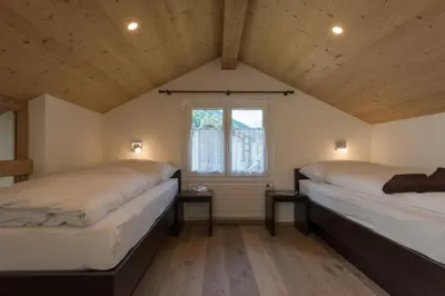 Ein Bett oder Betten in einem Zimmer der Unterkunft Haus Bergsonne