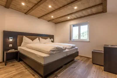 Ein Bett oder Betten in einem Zimmer der Unterkunft Haus Bergsonne