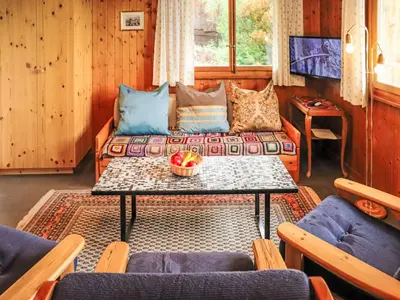 Ein Sitzbereich in der Unterkunft Chalet Mungg by Interhome