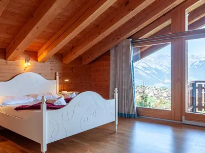Ein Bett oder Betten in einem Zimmer der Unterkunft Chalet Agneau by Interhome