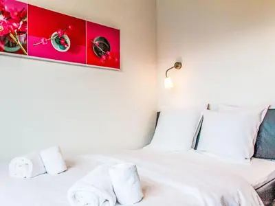 Ein Bett oder Betten in einem Zimmer der Unterkunft Apartment Les Arolles A1 by Interhome