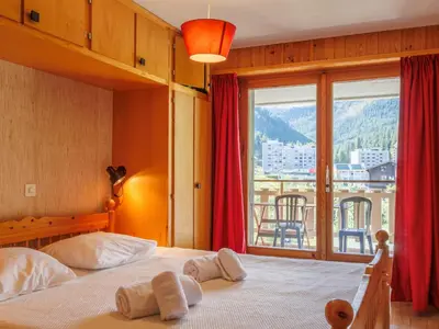 Ein Bett oder Betten in einem Zimmer der Unterkunft Apartment Dents Rousses H2 by Interhome
