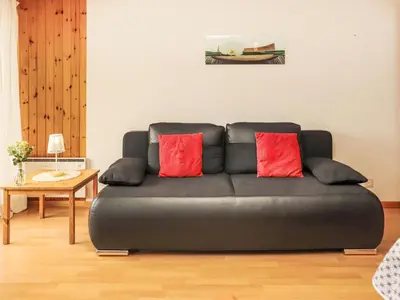 Ein Sitzbereich in der Unterkunft Apartment Dents Rousses I2 by Interhome