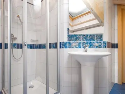 Ein Badezimmer in der Unterkunft Apartment Aquila by Interhome