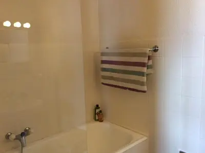 Ein Badezimmer in der Unterkunft Immeuble Belvédère