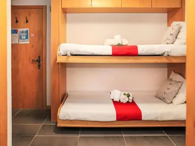 Ein Bett oder Betten in einem Zimmer der Unterkunft Apartment Dents Rousses E3 by Interhome