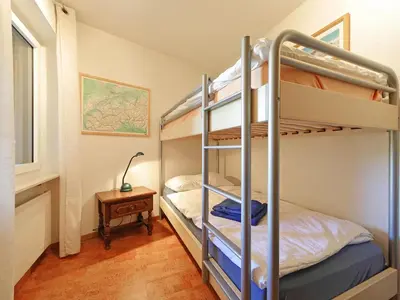 Ein Bett oder Betten in einem Zimmer der Unterkunft Apartment Bodmen A by Interhome