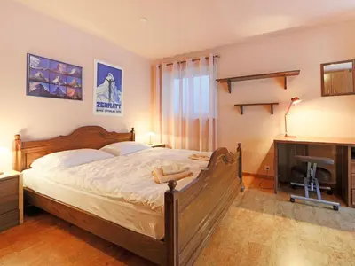 Ein Bett oder Betten in einem Zimmer der Unterkunft Apartment Bodmen A by Interhome