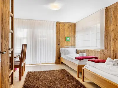 Ein Bett oder Betten in einem Zimmer der Unterkunft Apartment Rütschi-6 by Interhome