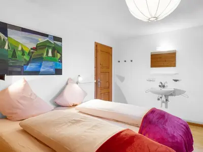 Ein Bett oder Betten in einem Zimmer der Unterkunft Chalet Rietsli by Interhome