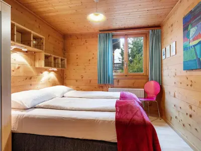 Ein Bett oder Betten in einem Zimmer der Unterkunft Chalet Rietsli by Interhome