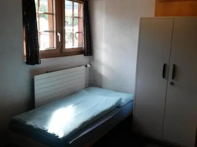 Ein Bett oder Betten in einem Zimmer der Unterkunft Apartment ABC Ferienwohnung 3 1- OG Nord-Ost by Interhome