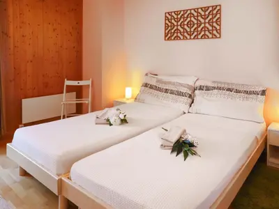Ein Bett oder Betten in einem Zimmer der Unterkunft Chalet Chalet Praline by Interhome