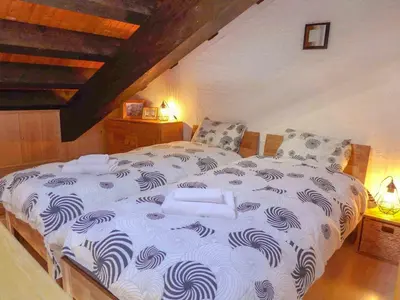 Ein Bett oder Betten in einem Zimmer der Unterkunft Apartment Le Tsaumiau A 17 by Interhome