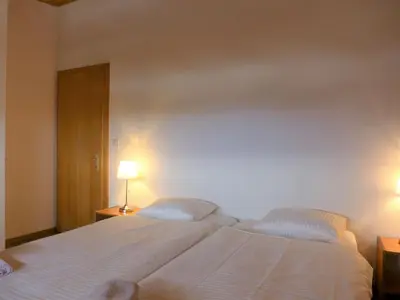 Ein Bett oder Betten in einem Zimmer der Unterkunft Apartment Victoria C 8 by Interhome