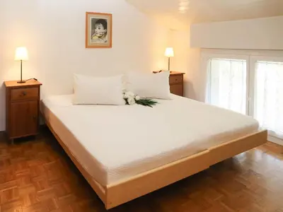 Ein Bett oder Betten in einem Zimmer der Unterkunft Apartment Marigny Andolla 23 by Interhome