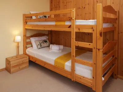Ein Bett oder Betten in einem Zimmer der Unterkunft Chalet Gamine by Interhome