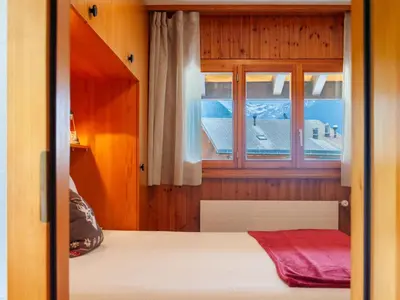 Ein Bett oder Betten in einem Zimmer der Unterkunft Apartment Les Crêtes 1-3 by Interhome