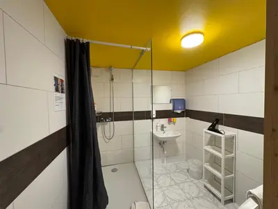 Ein Badezimmer in der Unterkunft Downtown Family&Friends