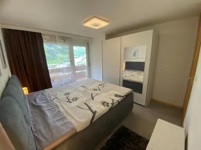 Ein Bett oder Betten in einem Zimmer der Unterkunft Lärchenwald 1804