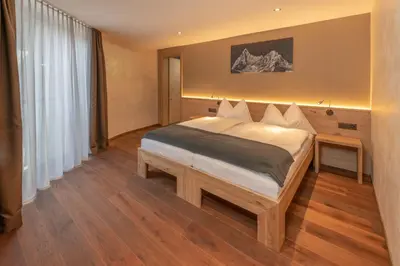 Ein Bett oder Betten in einem Zimmer der Unterkunft Hotel Heimatlodge