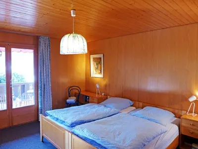 Ein Bett oder Betten in einem Zimmer der Unterkunft Holiday Home Chalet Marietta by Interhome