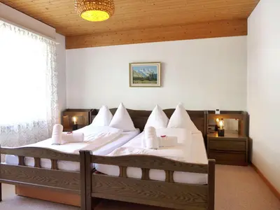 Ein Bett oder Betten in einem Zimmer der Unterkunft Holiday Home Salzhubelweg by Interhome