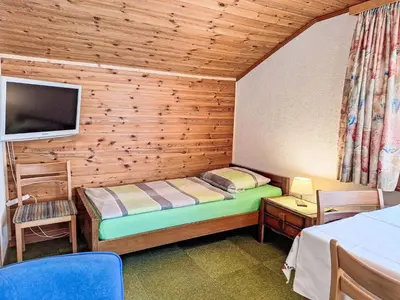 Ein Bett oder Betten in einem Zimmer der Unterkunft Apartment Chalet Marie Rosa-3 by Interhome