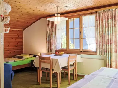 Ein Bett oder Betten in einem Zimmer der Unterkunft Apartment Chalet Marie Rosa-3 by Interhome