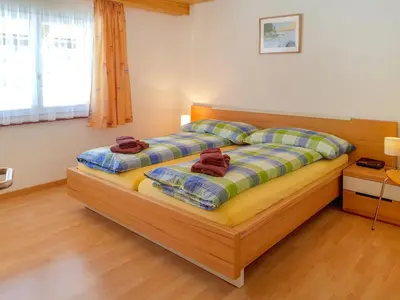 Ein Bett oder Betten in einem Zimmer der Unterkunft Apartment Oberei by Interhome
