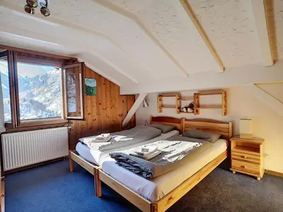 Ein Bett oder Betten in einem Zimmer der Unterkunft Apartment with beautiful views in Zermatt