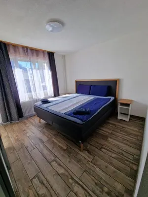 Ein Bett oder Betten in einem Zimmer der Unterkunft Family friendly Apartment in the heart of Interlaken