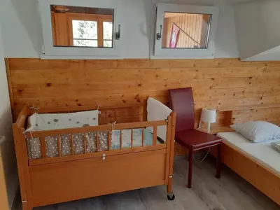 Ein Bett oder Betten in einem Zimmer der Unterkunft Berner Oberland