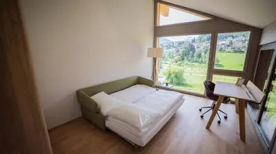 Ein Bett oder Betten in einem Zimmer der Unterkunft Seaside-Lodge, Top Apartment